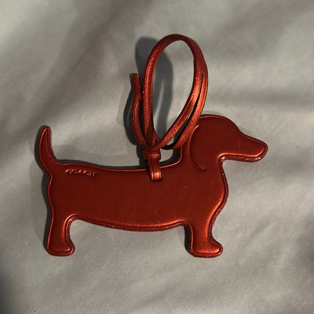 Coach dachshund bag charm (brick color)